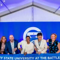 Group getting read to cut ribbon